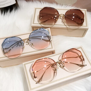 2022 Fashion Tea Gradient Sunglasses Women Ocean Water Cut Trimmed Lens Metal Curved Temples Sun Glasses Female UV400 1